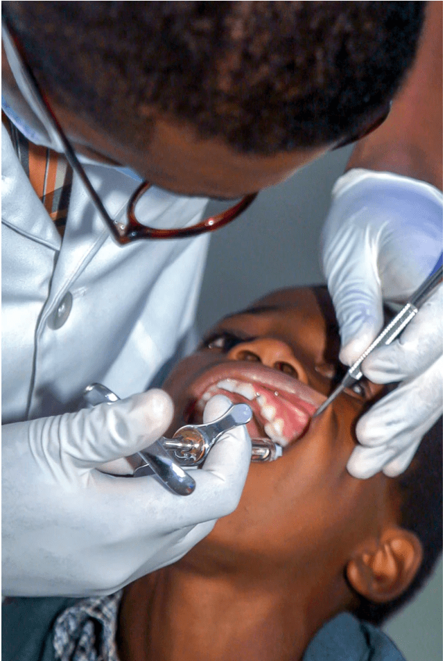 Dentist administering anesthesia