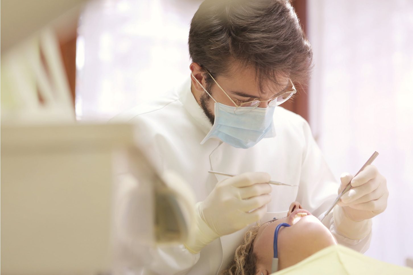 Dentist working on patient