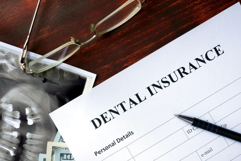 how much is a visit to the dentist without insurance